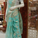 Mint green tissue saree with brocade blouse