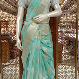 Mint green tissue saree with brocade blouse