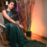 Forest green sequin saree with readymade sequin blouse