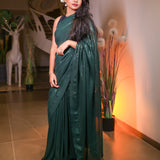 Forest green sequin saree with readymade sequin blouse