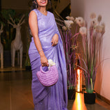 Lavender sequin saree with sequin readymade blouse.