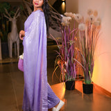 Lavender sequin saree with sequin readymade blouse.