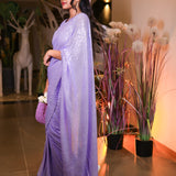 Lavender sequin saree with sequin readymade blouse.