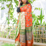 Brick semi tussar saree with contrast attached blouse.