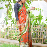 Brick semi tussar saree with contrast attached blouse.