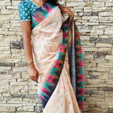 Semi tussar saree with contrast indigo unstitched blouse