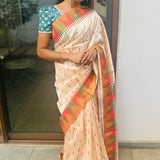 Semi tussar saree with contrast copper unstitched blouse