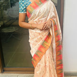 Semi tussar saree with contrast copper unstitched blouse