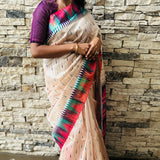 Semi tussar saree with contrast pink unstitched blouse.