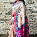 Semi tussar saree with contrast pink unstitched blouse.