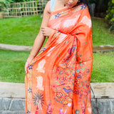 Orange semi tussar saree with unstitched printed blouse