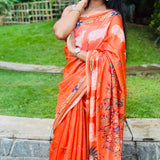 Orange semi tussar saree with unstitched printed blouse