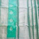 Green tissue saree with brocade blouse