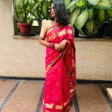 Pink semi tussar saree with printed unstitched blouse.