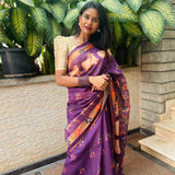 Violet semi tussar saree with printed unstitched blouse.