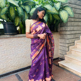 Violet semi tussar saree with printed unstitched blouse.