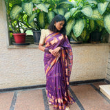 Violet semi tussar saree with printed unstitched blouse.