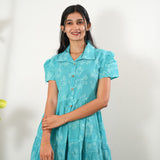 Turquoise hibiscus button down maxi dress