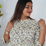 Beige floral  cotton a-line kurti