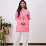 Peach peplum cotton full sleeve short kurti