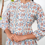 Off white and peach pintex cotton short kurti