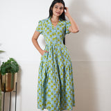 Pastel green button down cotton midi dress