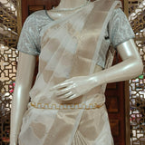 Off white tissue saree with brocade blouse