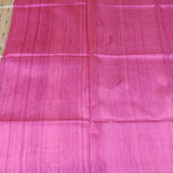 Semi tussar saree with contrast pink unstitched blouse.